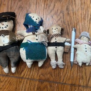 Primitive Snowman Family